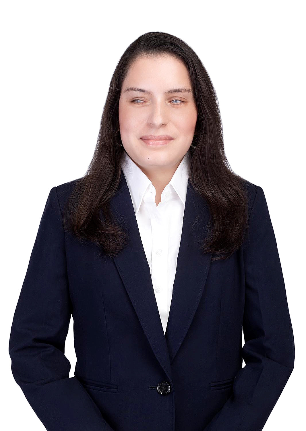 Priscilla Garces, smiling slightly, in a navy blazer over a white collared shirt, photographed against a white background.
